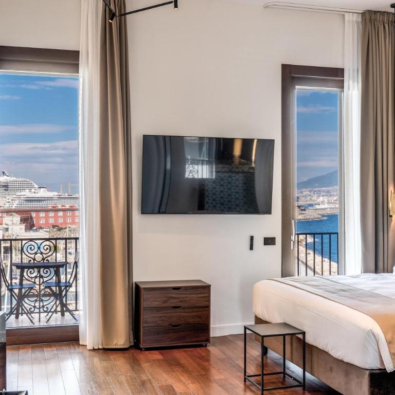 Sette Stelle Suites - Camera Queen con Vista Mare - 1