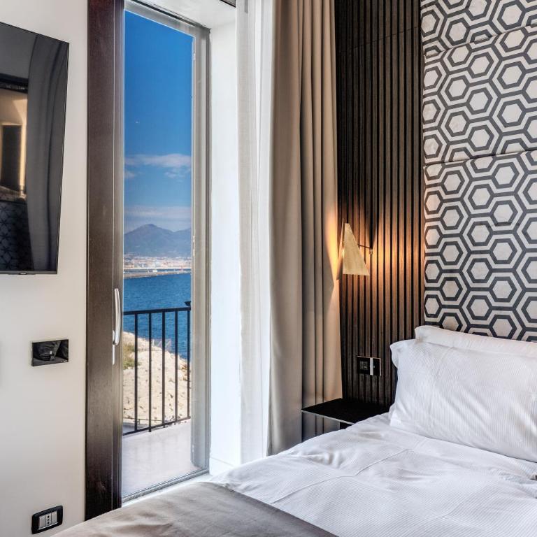 Sette Stelle Suites - Camera Queen con Vista Mare - 10