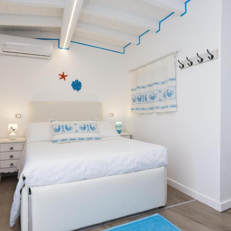 PALMASERA CHARMING - Rooms & Suites - Suite con Vista Giardino - 11