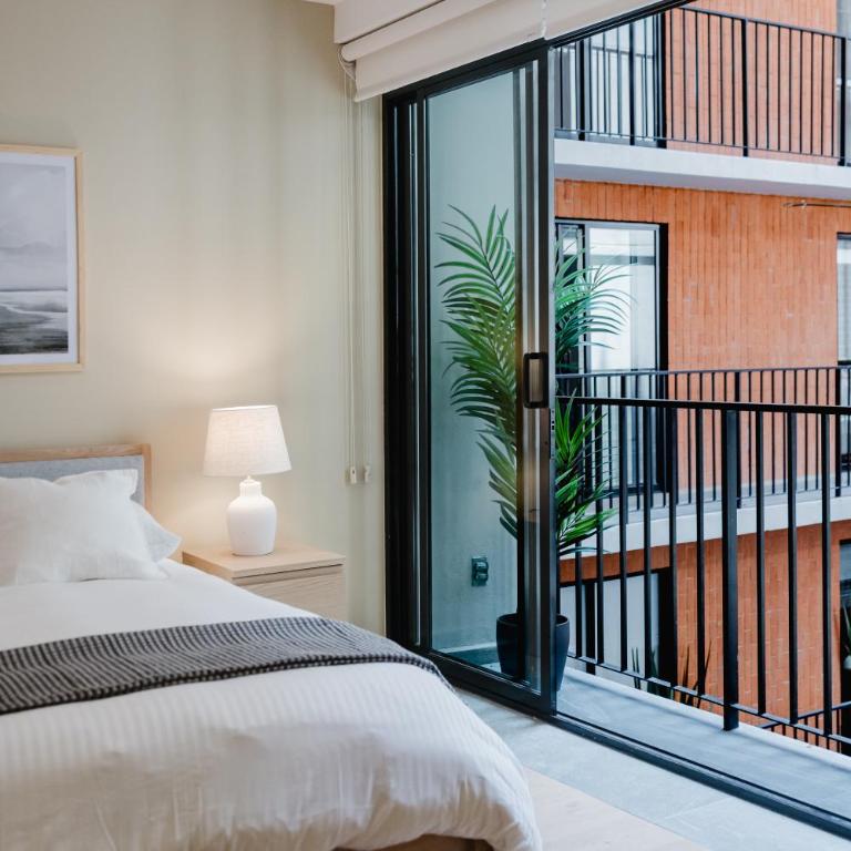 Chic Loft Near Roma Design, Comfort & Rooftop Pool - Apartamento - 8