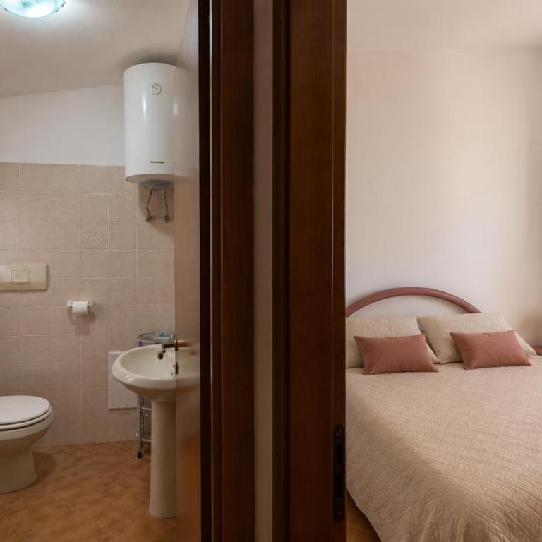 AffittaSardegna-Casa dei Pini - Appartamento con 4 Camere da Letto - 14