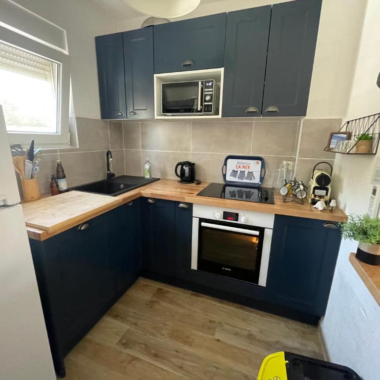 Grain de sable, classé 3 étoiles , les pieds dans l'eau - Three-Bedroom Apartment - 5