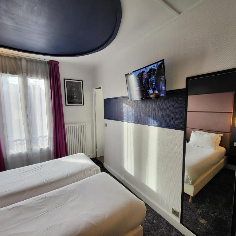 Accueil Hôtel Paris Pigalle Montmartre - Hôtel rénové - Chambre Lits Jumeaux Standard - 12