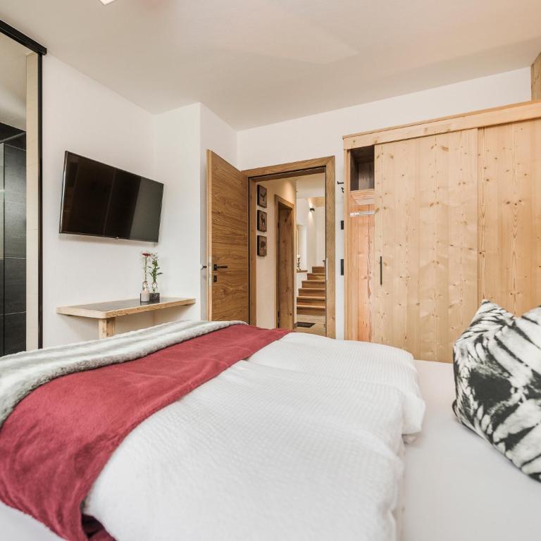 Feriendorf Joggler - Chalets nahe der Gondel - Haus mit 4 Schlafzimmern - 7