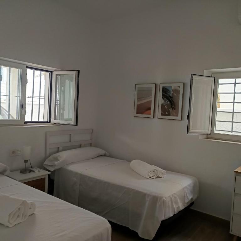 Casa unifamiliar a 10 pasos de la arena con parking - Casa - 39