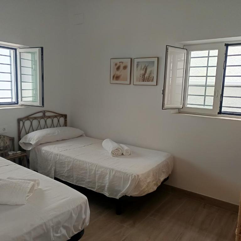 Casa unifamiliar a 10 pasos de la arena con parking - Casa - 37