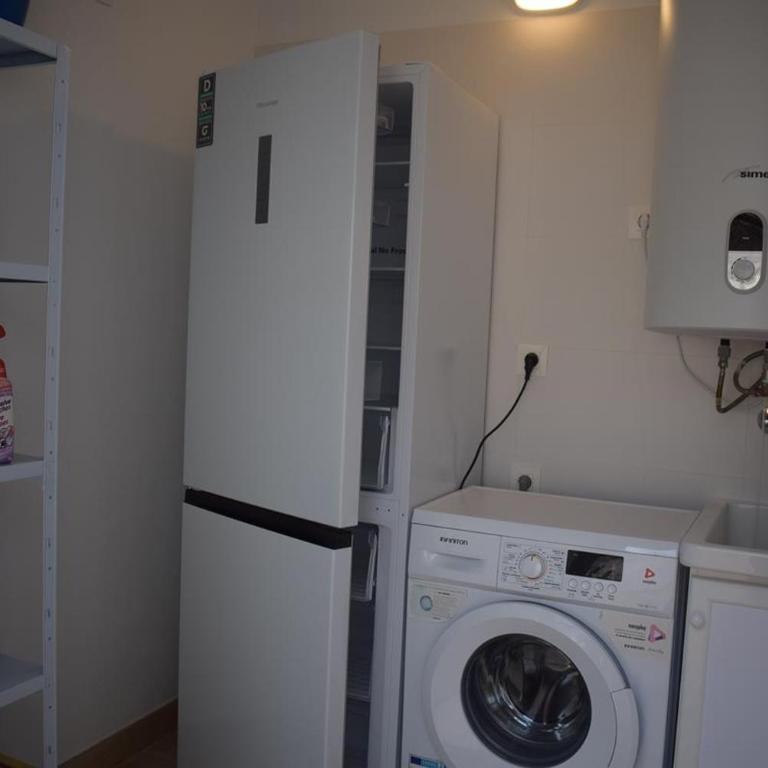 Casa unifamiliar a 10 pasos de la arena con parking - Casa - 56