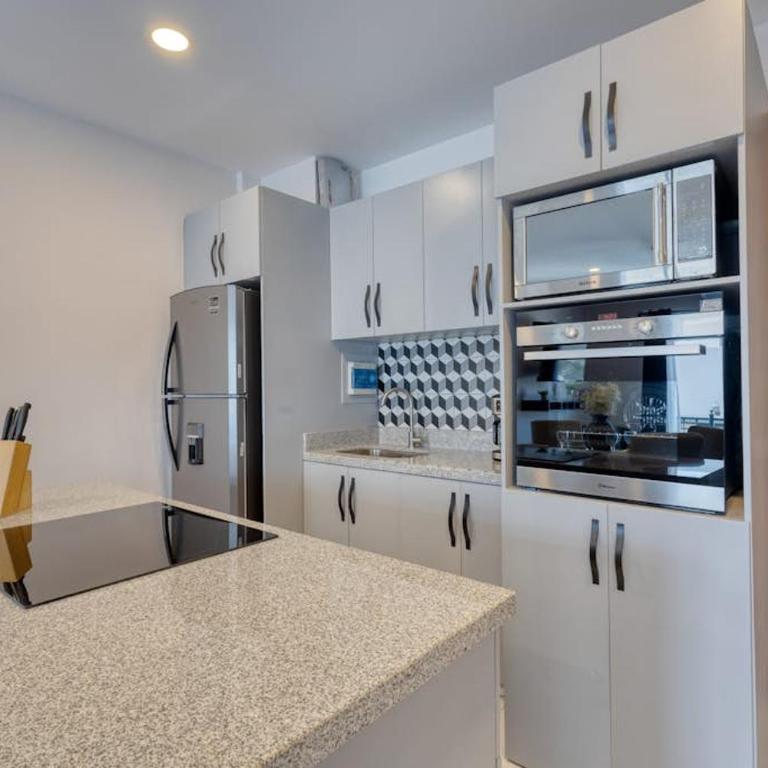 Dog-friendly Apartment with Rooftop Infinity Pool, Gym, Central AC & Balcony - Casa - 5