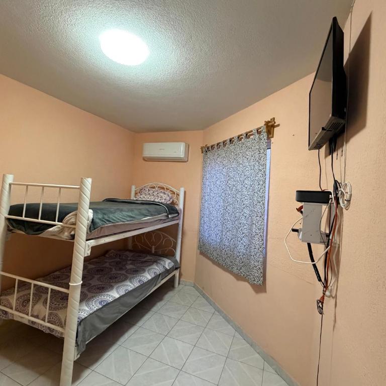 Relu verde y sol - Casa con 1 dormitorio - 11