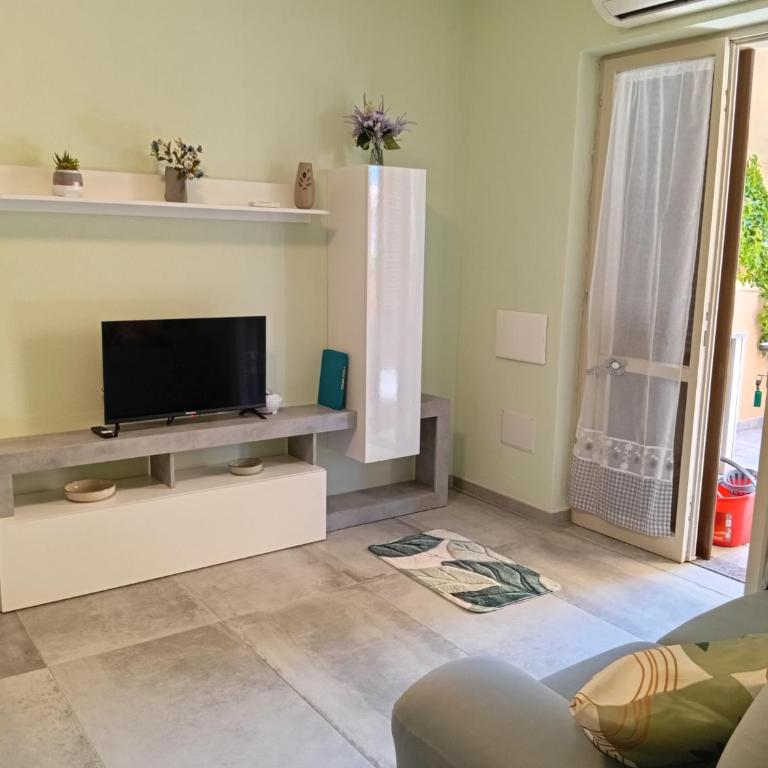 Appartamento Salvia, veranda e giardino a 75 m dal mare - Casa con 1 dormitorio - 12