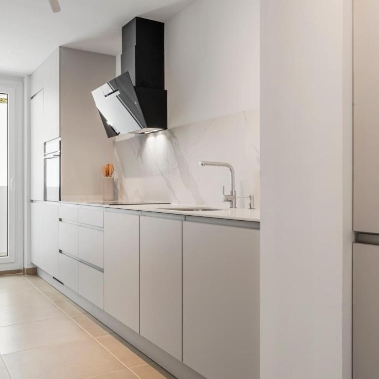 Stylish Poolview City Apartment - Three-Bedroom Apartment with Balcony - 7
