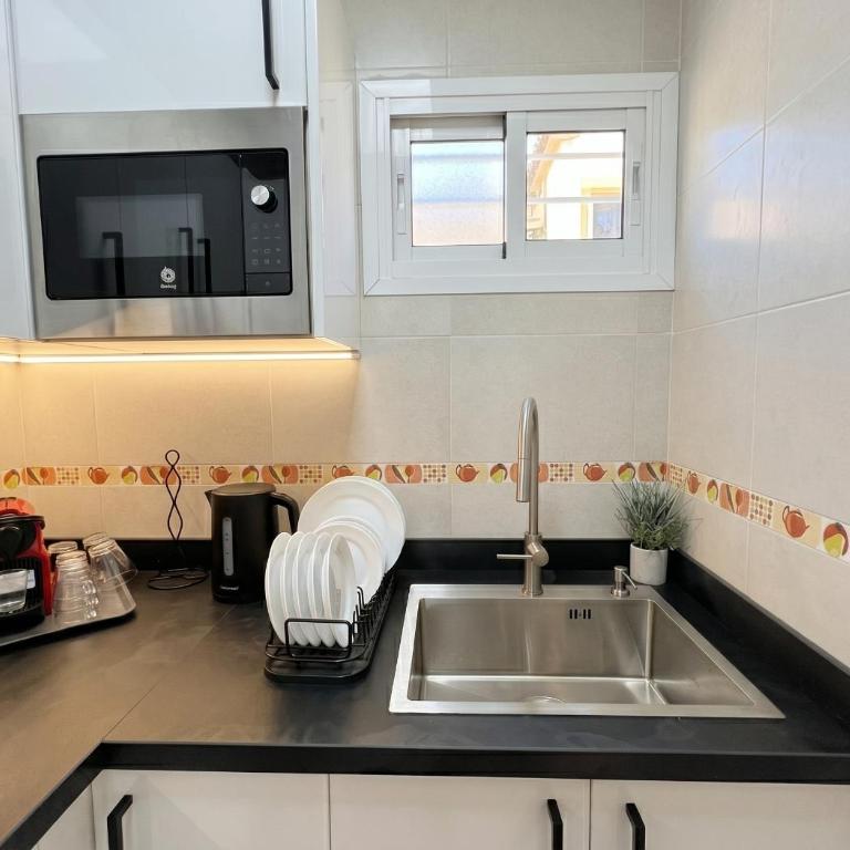 Oasis de Luz y Diseño ,Tu Refugio con Terraza y Piscina , cerca de la Playa - One-Bedroom Apartment - 17