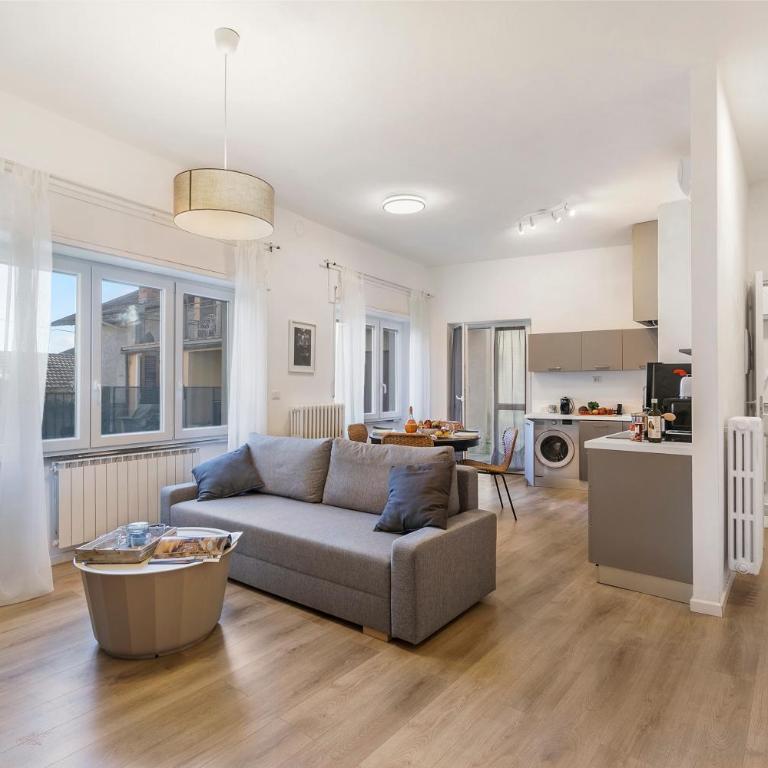 Gaia on Stresa Hill: 2BR with AC and Outdoor Space - Happy Rentals - Two-Bedroom Apartment with Mountain View - 1