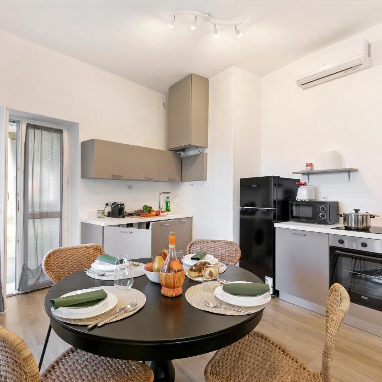 Gaia on Stresa Hill: 2BR with AC and Outdoor Space - Happy Rentals - Two-Bedroom Apartment with Mountain View - 5