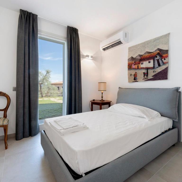 Agriturismo Casa Irma - Appartamento Deluxe con 2 Camere da Letto e Vista Giardino - 13