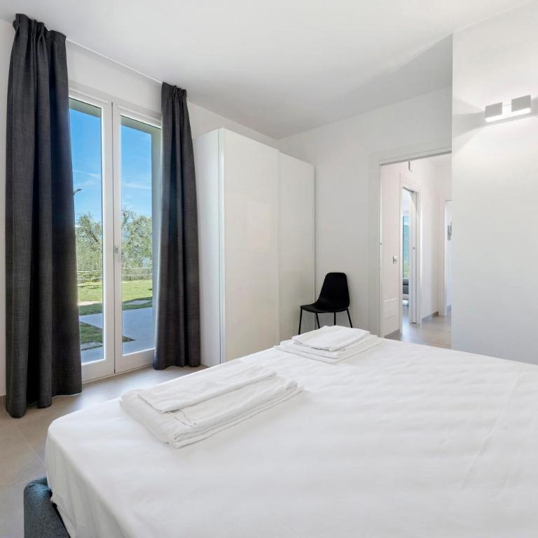 Agriturismo Casa Irma - Appartamento Deluxe con 2 Camere da Letto e Vista Giardino - 9
