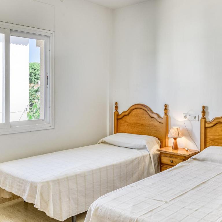 Casa con piscina comunitaria - Maison de Vacances - 28