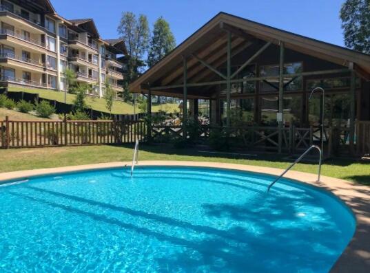 Departamento Pucón estacionamiento piscina - Three-Bedroom Apartment - 8