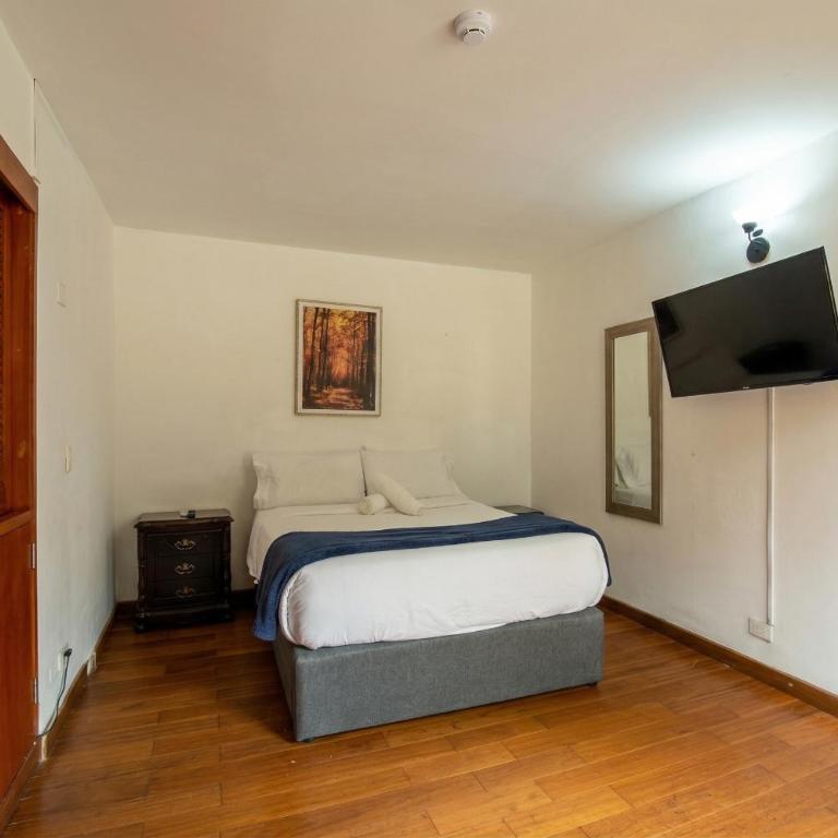 Finca Hotel 12 Palmas- Aeropuerto JMC - Habitación adaptada para personas con movilidad reducida - Cama grande - 1
