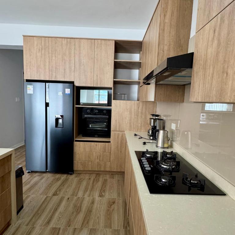 Departamento nuevo, lujoso y espacioso - Four-Bedroom Deluxe Apartment - 18
