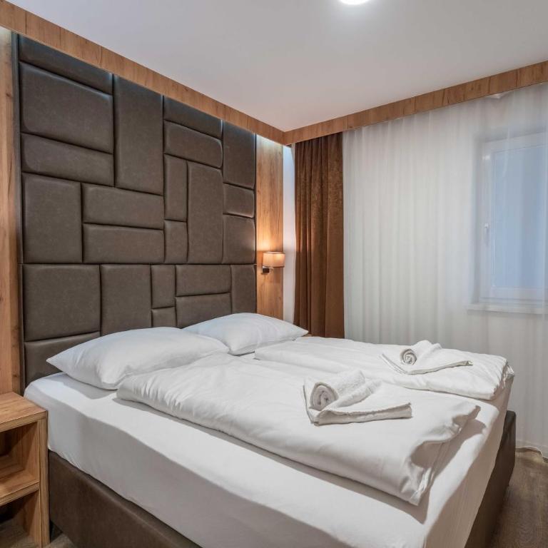 Maiskogelblick Apartments by we rent - Deluxe-Apartment mit 2 Schlafzimmern und Gartenblick - 12