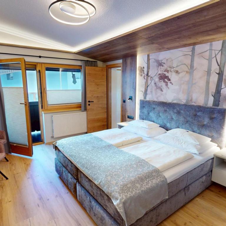 Hotel-Garni Jakober - B&B und Appartements - Deluxe Doppelzimmer mit Balkon - 1