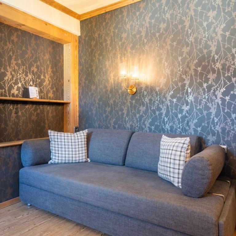 Dreimäderlhaus - Das vegetarische Boutique Hotel - Comfort Dreibettzimmer mit Straßenblick - 10