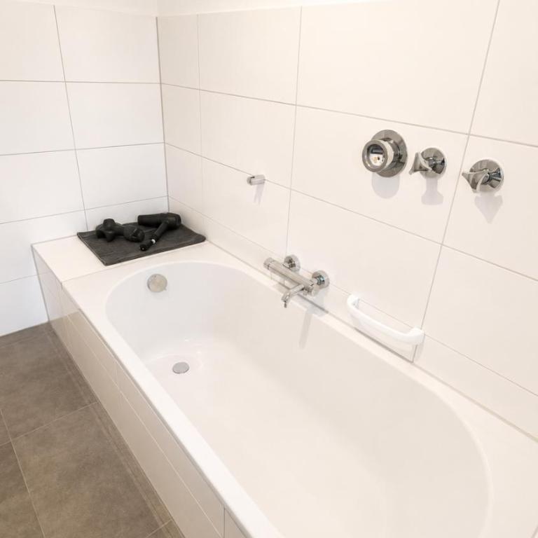 Allgäu Living l Ferienhaus 5 Apartments - Sauna - Balkon - Garten - Parkplatz - Familienfreundlich - Apartment mit 2 Schlafzimmern und Gartenblick - 5