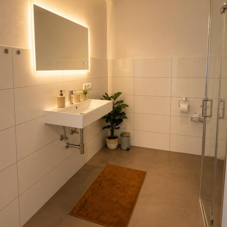 Allgäu Living l Ferienhaus 5 Apartments - Sauna - Balkon - Garten - Parkplatz - Familienfreundlich - Apartment mit 2 Schlafzimmern und Gartenblick - 6