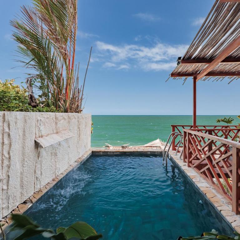 Jaguar Beachfront Ecohotel & Spa - King Suite with Pool View - 22
