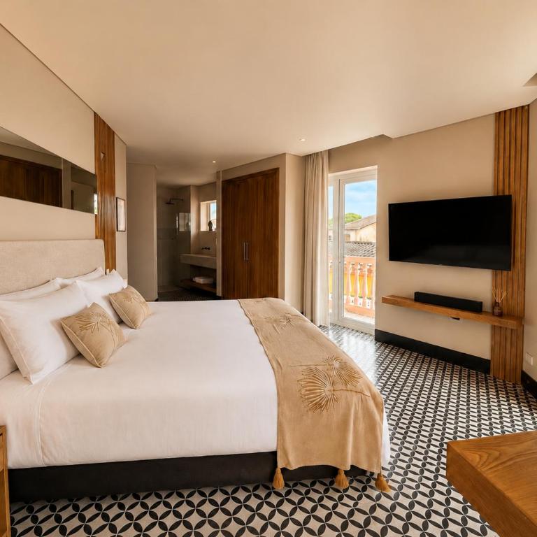 Casa Maya Cartagena - Habitación con cama extragrande y balcón - 1