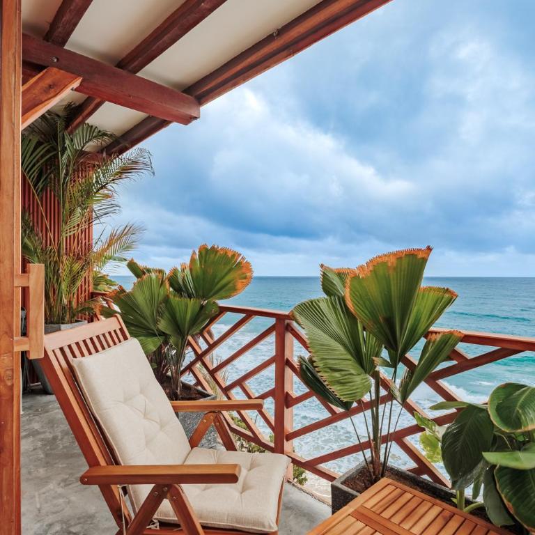 Jaguar Beachfront Ecohotel & Spa - Deluxe Suite with Sea View - 17