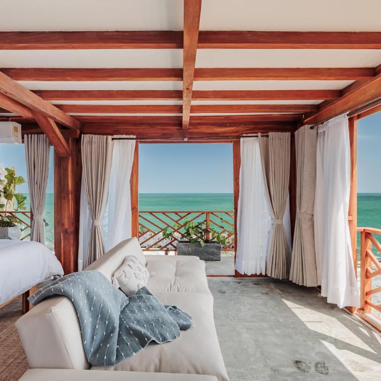 Jaguar Beachfront Ecohotel & Spa - Deluxe Suite with Sea View - 13