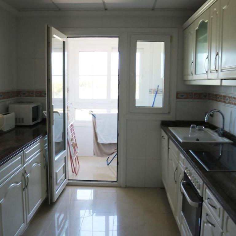Magnificent apartment with a pool in Oliva Nova - Three-Bedroom Apartment with Balcony - 21