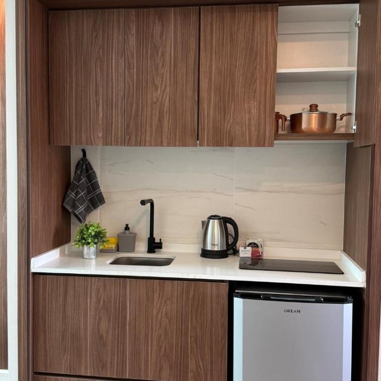 Departamento con SUM gimnasio y parrilla - Apartamento de 1 dormitorio - 13