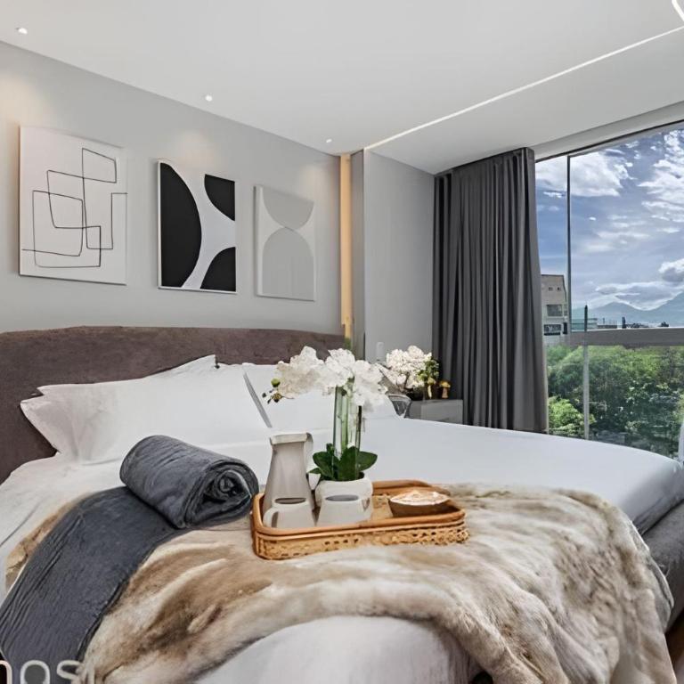 Chic 1BR • Luxury, Pool, Gym • Steps from Provenza - Apartment - 3