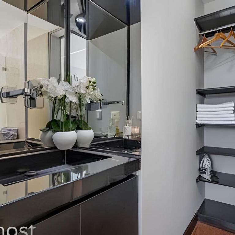 Chic 1BR • Luxury, Pool, Gym • Steps from Provenza - Apartment - 19
