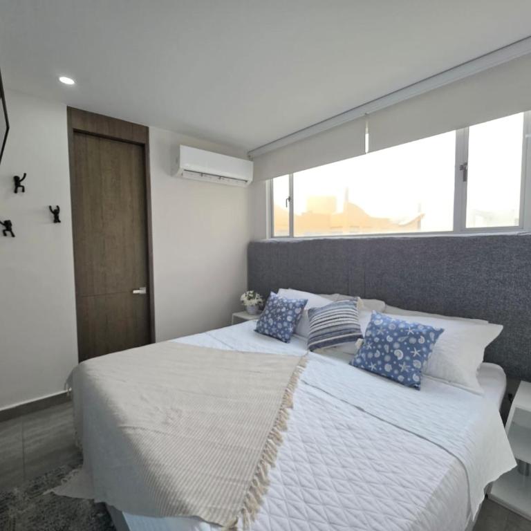 Cartagena Centro de Convenciones Hotel de las Americas con salida a playa 2BR Wifi - Two-Bedroom Apartment with Garden View - 19
