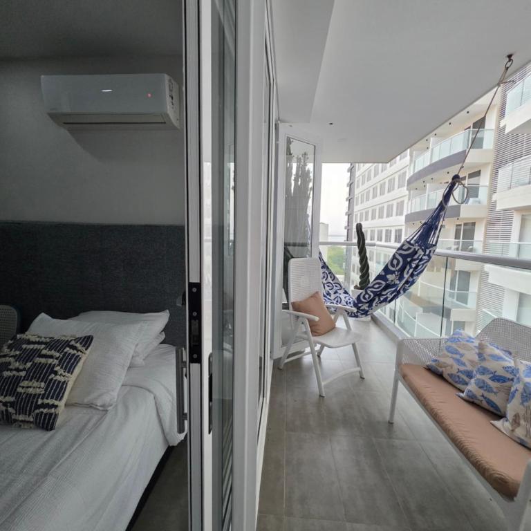 Cartagena Centro de Convenciones Hotel de las Americas con salida a playa 2BR Wifi - Two-Bedroom Apartment with Garden View - 31