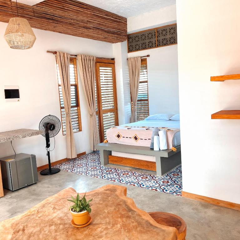 Casa Mambo Salinas - Habitación Cuádruple - vistas al jardín - 1
