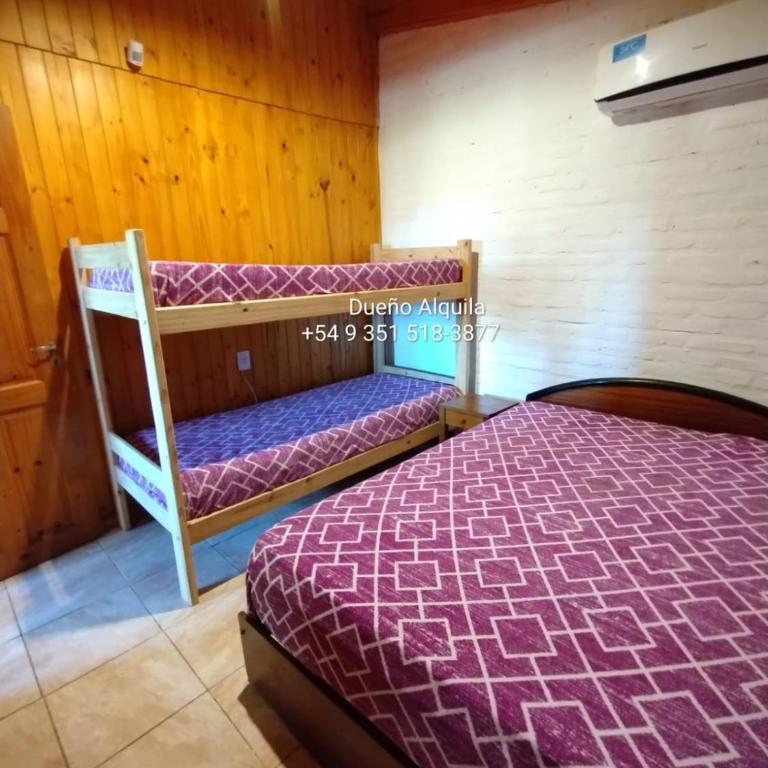Cabaña a 13 cuadras de la Playa Principal - Two-Bedroom House - 11