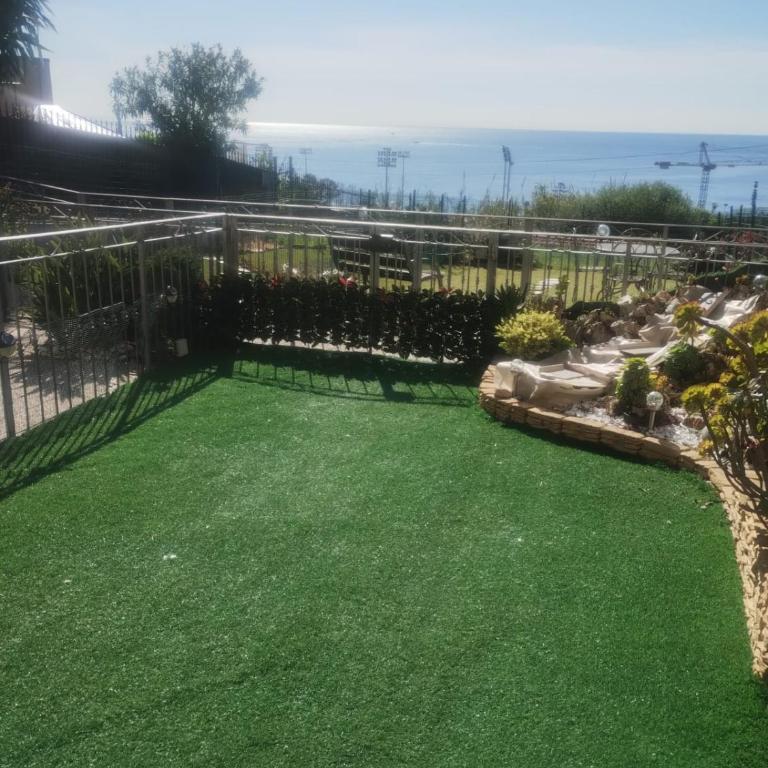 Bilocale con giardino, vista mare e parcheggio privato - Apartamento de 1 dormitorio - 21