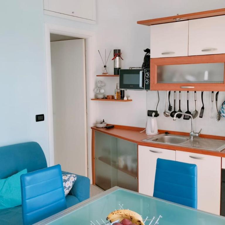 Bilocale con giardino, vista mare e parcheggio privato - Apartamento de 1 dormitorio - 27