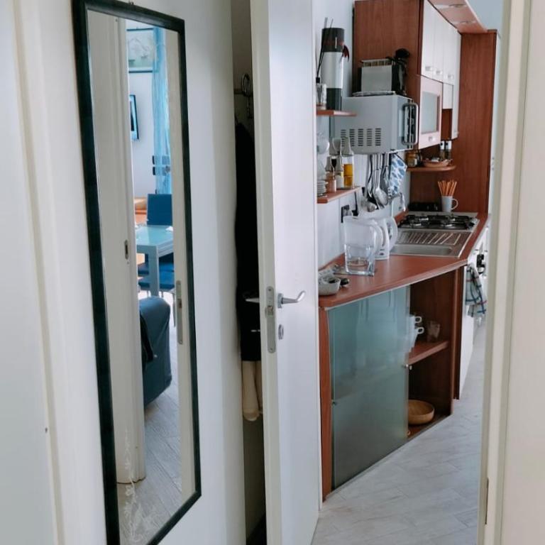 Bilocale con giardino, vista mare e parcheggio privato - Apartamento de 1 dormitorio - 29