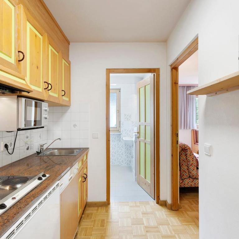 Residence Ciasa Ulli - Deluxe-Apartment mit 2 Schlafzimmern und Gartenblick - 17
