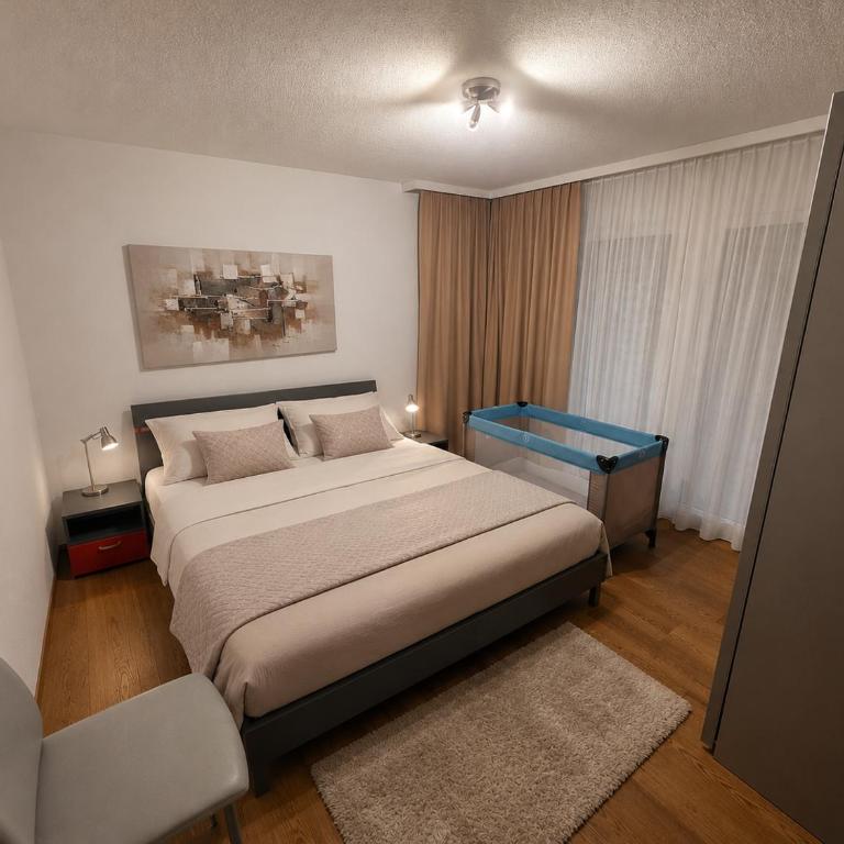 Residenz Ambassador 5 Sterne Luxus Apartments in Leukerbad mit Wellness & Fitness - Deluxe Apartment mit Balkon und 2 Schlafzimmern - 10
