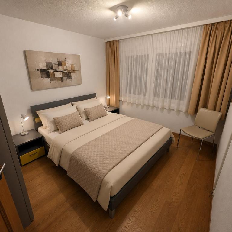 Residenz Ambassador 5 Sterne Luxus Apartments in Leukerbad mit Wellness & Fitness - Deluxe Apartment mit Balkon und 2 Schlafzimmern - 8