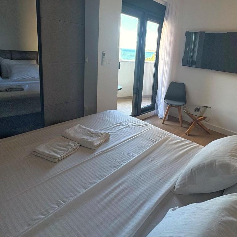 Luxury 2BR Sea View & Garage & Twin Towers Becici - Appartement 2 Chambres avec Terrasse et Vue sur la Mer - 4