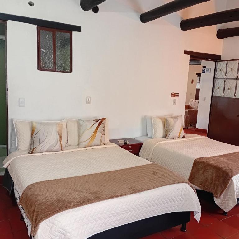 Aparta Hotel Eucalyptus - Habitación Triple con vistas a la montaña - 1