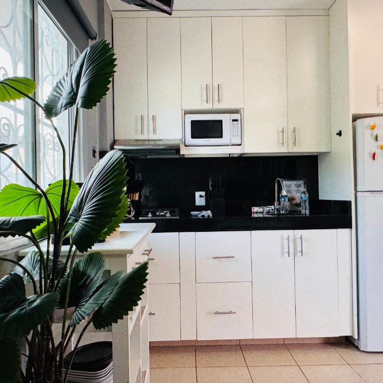 Polly's Home Aralias Boutique GuestHouse & PrivateSuites - Deluxe Zimmer mit Kingsize-Bett - 6